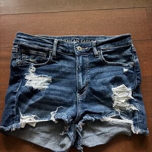 American Eagle Outfitters Women's Distressed Blue Denim Shorts with Lace Detail